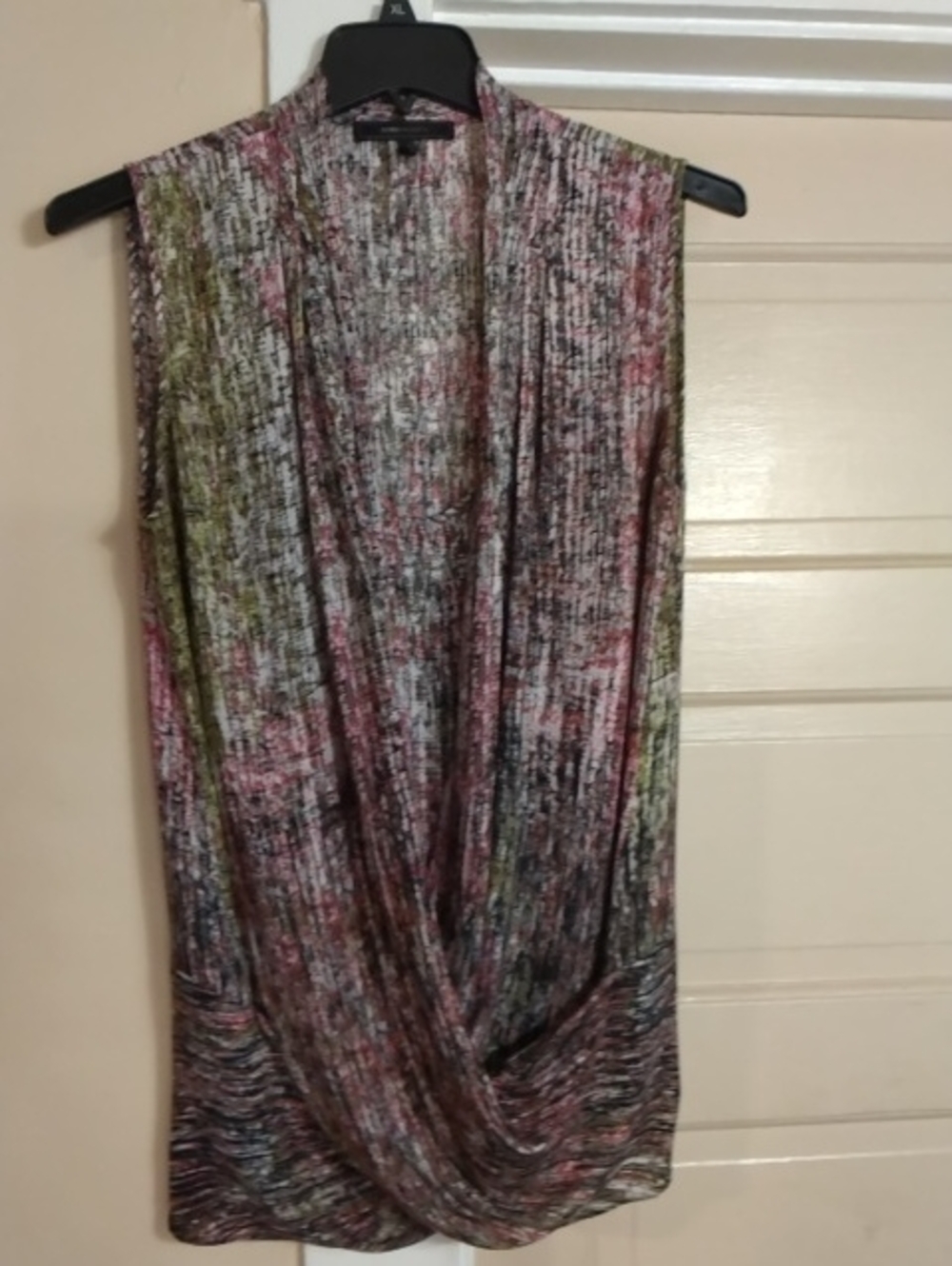 Women's patterned top label visible